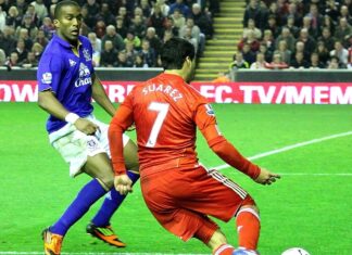 Luis Suarez and Distin - Merseyside derby - pic by Ruaraidh Gillies creative commons licence