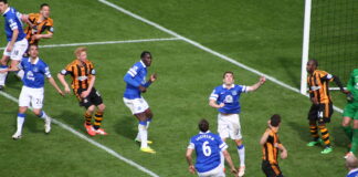 Everton players of old battle for the ball against Hull