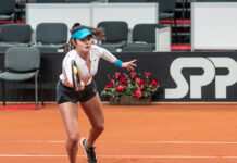 Emma Raducanu, British tennis star, playing on clay court in 2020