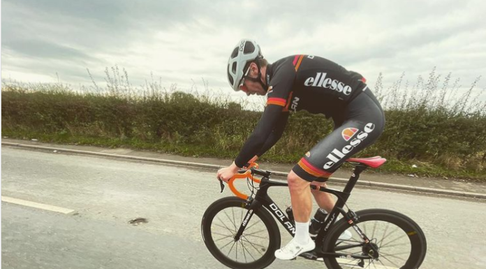 cyclist Declan Hudson riding his bike