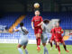 Liverpool's Rachel Furness winning a header against Aston Villa.