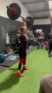 Becca Slater lifting weight. 