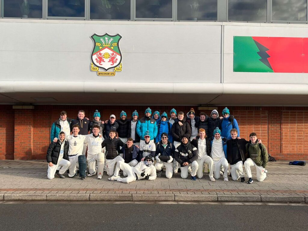 Cricket team outside The Racecourse Ground