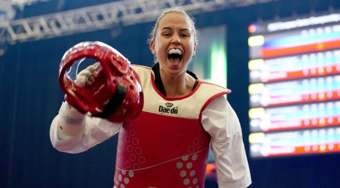 Beth Munro celebrates after winning her semifinal match against Denmark's Lisa Gjessing, during day Two of the European Taekwondo Championships 2022. Via agreed Alamy license.