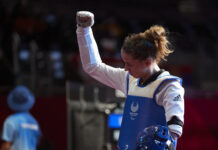 Beth Munro celebrates a Para Taekwondo victory.