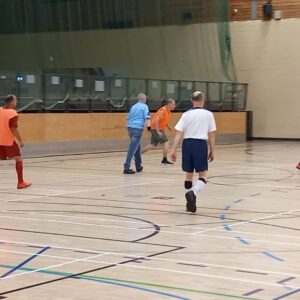 Mencap Liverpool members in football action. Credit - Mencap Liverpool, accessed and used with permission.