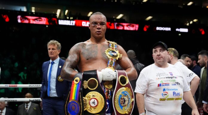 Fabio Wardley poses with his belts after his fight against Frazer Clarke - credit ALAMY IMAGES