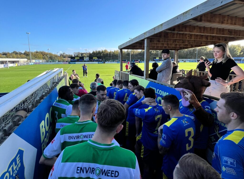 Stalybridge Celtic and Bootle FC prepare to walk out for their game at the Berry Street Garage Stadium