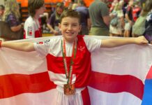 Zack Donnelly celebrates his WKC Gold medal for England in Albufeira, Portugal. Pic by Paul Donnelly