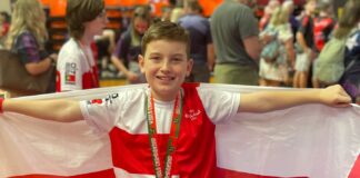 Zack Donnelly celebrates his WKC Gold medal for England in Albufeira, Portugal. Pic by Paul Donnelly