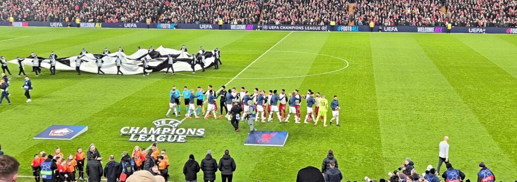 Liverpool and Lille line up ahead of kick off (Image by Jack Burgess)