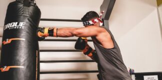 Boxing in the gym. Photo by John Wallace, Unsplash