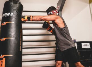 Boxing in the gym. Photo by John Wallace, Unsplash