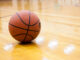 Basketball on hard wood court