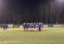 Birkenhead Park players in a huddle