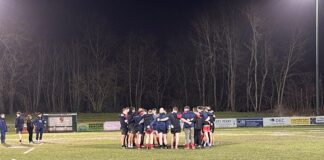 Birkenhead Park players in a huddle