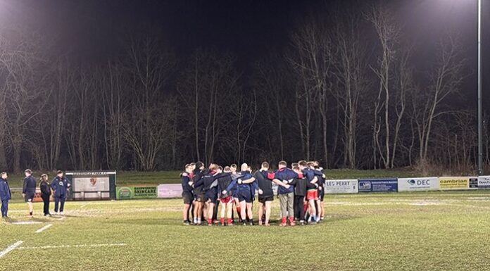 Birkenhead Park players in a huddle