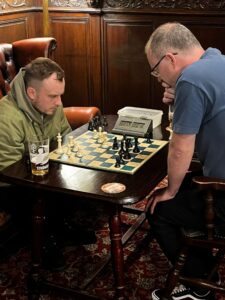 Members of Liverpool Chess Club playing chess