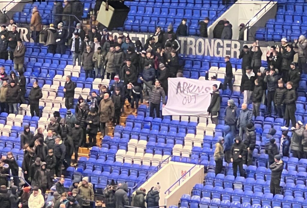 Tranmere Rover Fans display a banner stating "Adkins Out" after there 0-0 Draw to Fleetwood Town on Tuesday.