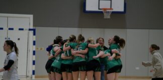 Liverpool Handball Club women's team celebrating after a hard fought win