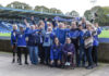 A group of female Bury FC fans inside Gigg Lane including Zoe Hitchen