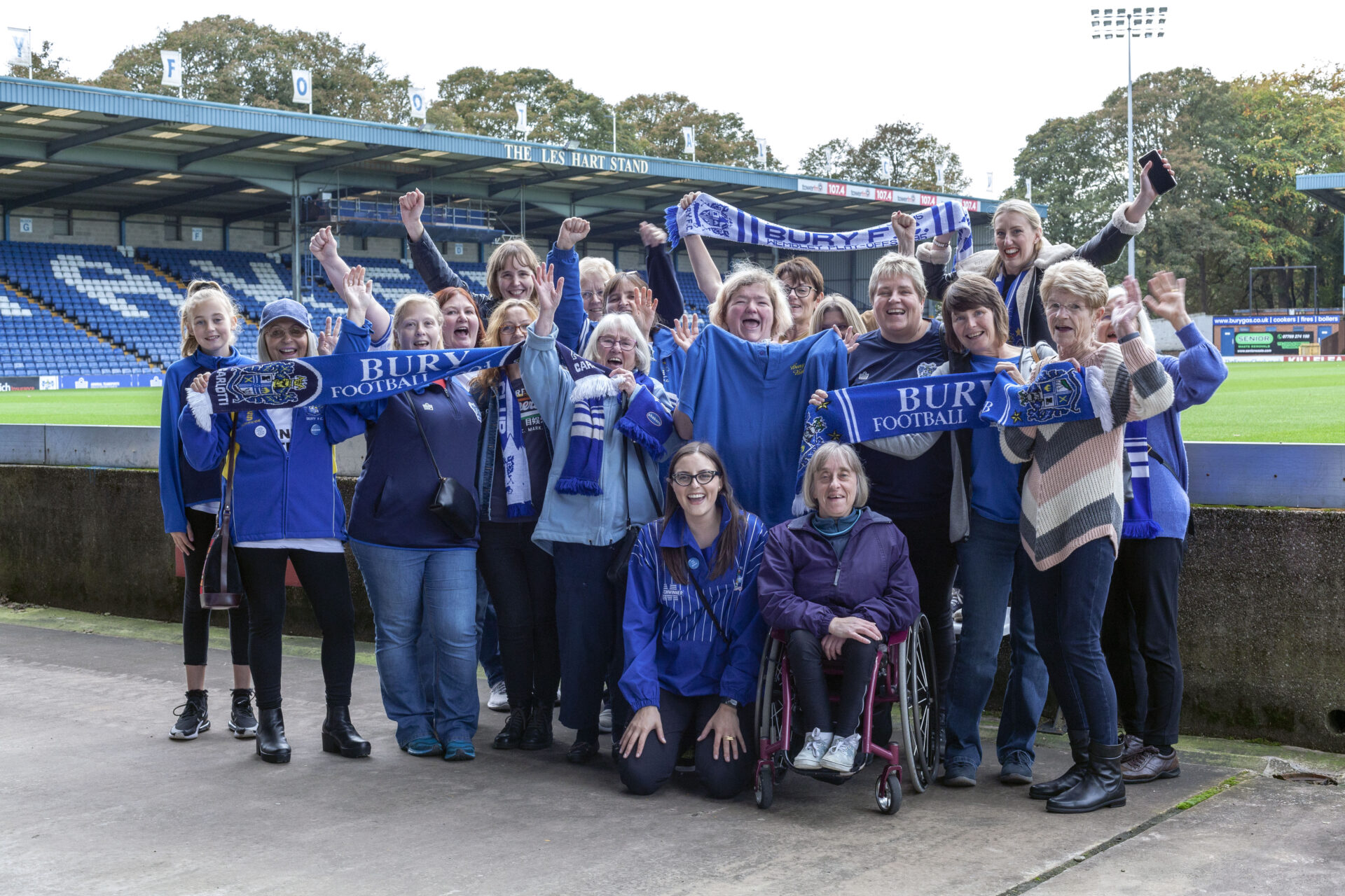 A group of female Bury FC fans inside Gigg Lane including Zoe Hitchen