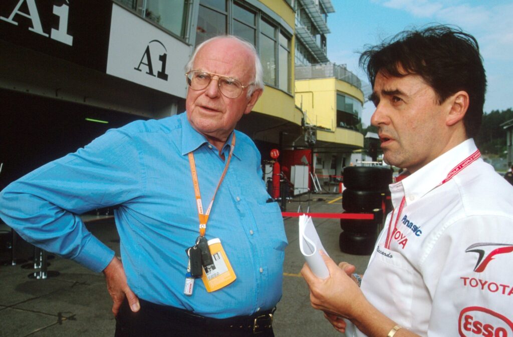 3AC8GH2 L-R: Dr Sid Watkins (GBR) FIA Medical Delegate talks to Dr Riccardo Ceccarelli (ITA) Toyota Team Doctor..Formula One World Championship, Rd6, Austrian Grand Prix, A1-Ring, Austria. 12 May 2002..BEST IMAGE (Credit Image: ©Sutton Motorsports/ZUMA Press)