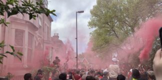Liverpool fans lining the Anfield Road by Daniel Moffat