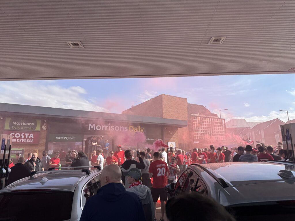 Liverpool fans at the top of Walton Breck Road by Daniel Moffat