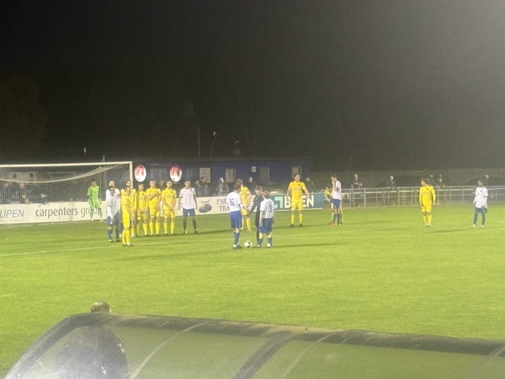 The Vauxhall players ready to take a free kick. Image by Rayhan Bengougou