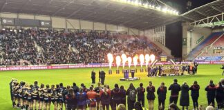 St Helens watch on as Wigan lift trophy / Dylan Jones