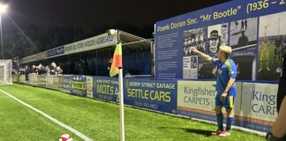 Ben Hodkinson takes a corner