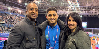 Rio (middle) standing in-between both his parents at the British Championships in Birmingham. Pic by Aled James.
