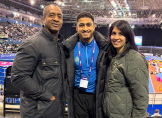 Rio (middle) standing in-between both his parents at the British Championships in Birmingham. Pic by Aled James.