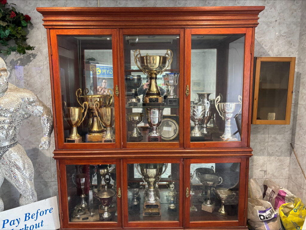 Bill Jones' trophy cabinet displayed in Gym 21. Image by Oscar Howell