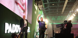 Luke Littler waves fans on following victory in the World Championship. Photo by Alex Parker.