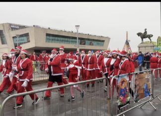 Thousands of Santas dash through Liverpool in festive charity run