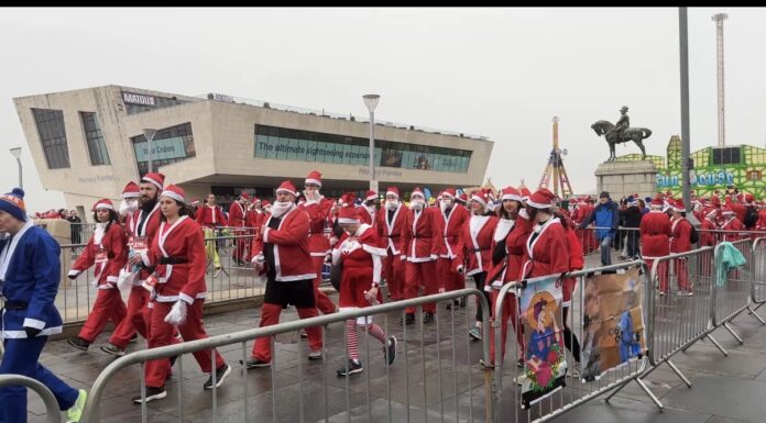 Thousands of Santas dash through Liverpool in festive charity run