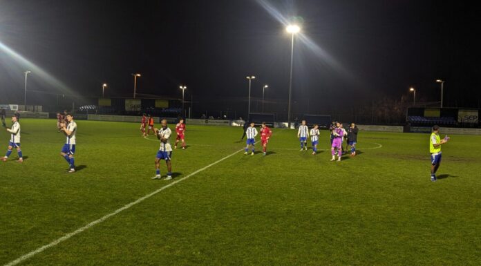 AFC Liverpool humbled by league leaders Wythenshawe in feisty clash Wythenshawe players clapping Luke Patrick