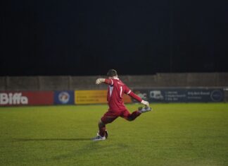 Motors number one Reece Trueman takes a free kick. Image by Hollie McCulloch