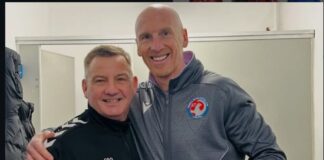 Kevin Ellison with a coach via Instagram