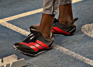 Northern Indoor Championships prompt reflection for Merseyside Athletics Close-up shot of Ruachkuoth Ter before the semi-final of the 200m in the Northern Indoor Championships. Pic by Aled James.
