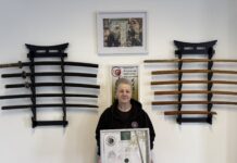 Sue King holding certificate