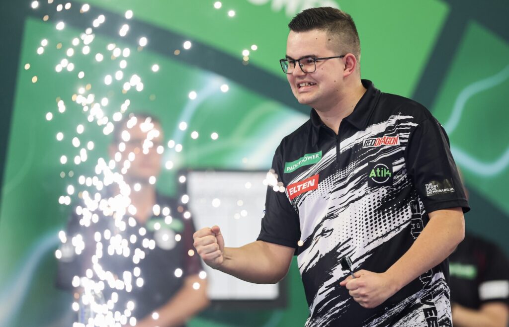 Gian van Veen celebrating on stage. Photo by PDC.