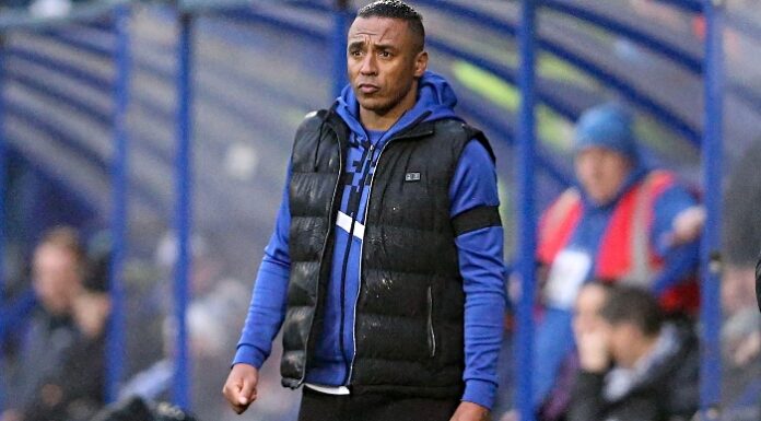 Southport move seven points clear from drop zone with 2-1 win at promotion chasing Radcliffe Neil Danns - Southport manager - image from Alamy under agreed licence
